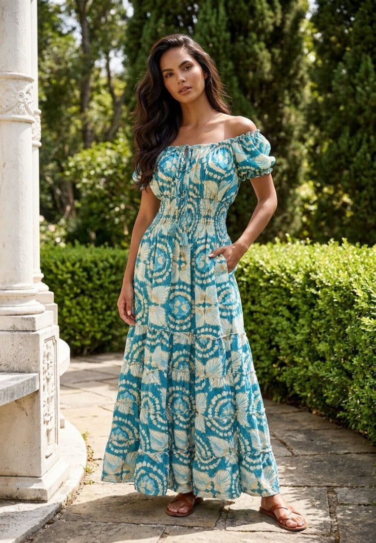 Woman wearing Coral Secret Maxi Dress in a villa n Europe