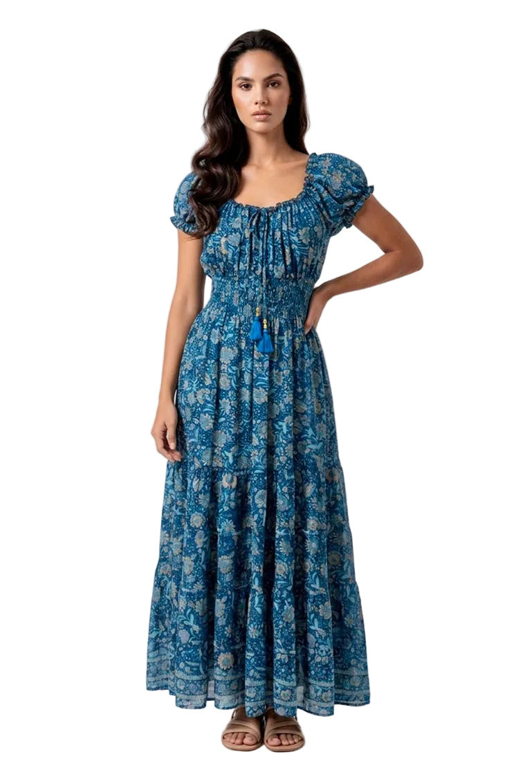 Woman wearing a blue floral  Off Shoulder Silk Maxi Dress from Coral Secret