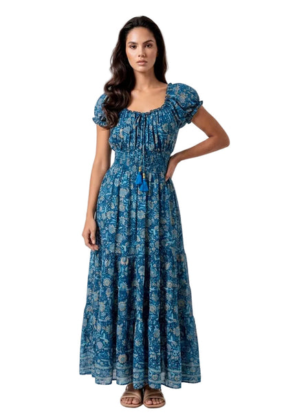 Woman wearing a blue floral  Off Shoulder Silk Maxi Dress from Coral Secret