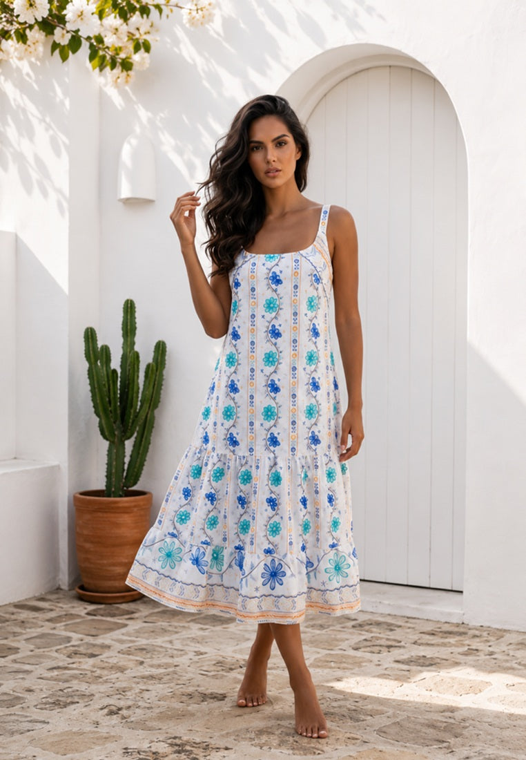Woman wearing Santorini Floral Tiered Maxi Dressfrom coral secret  